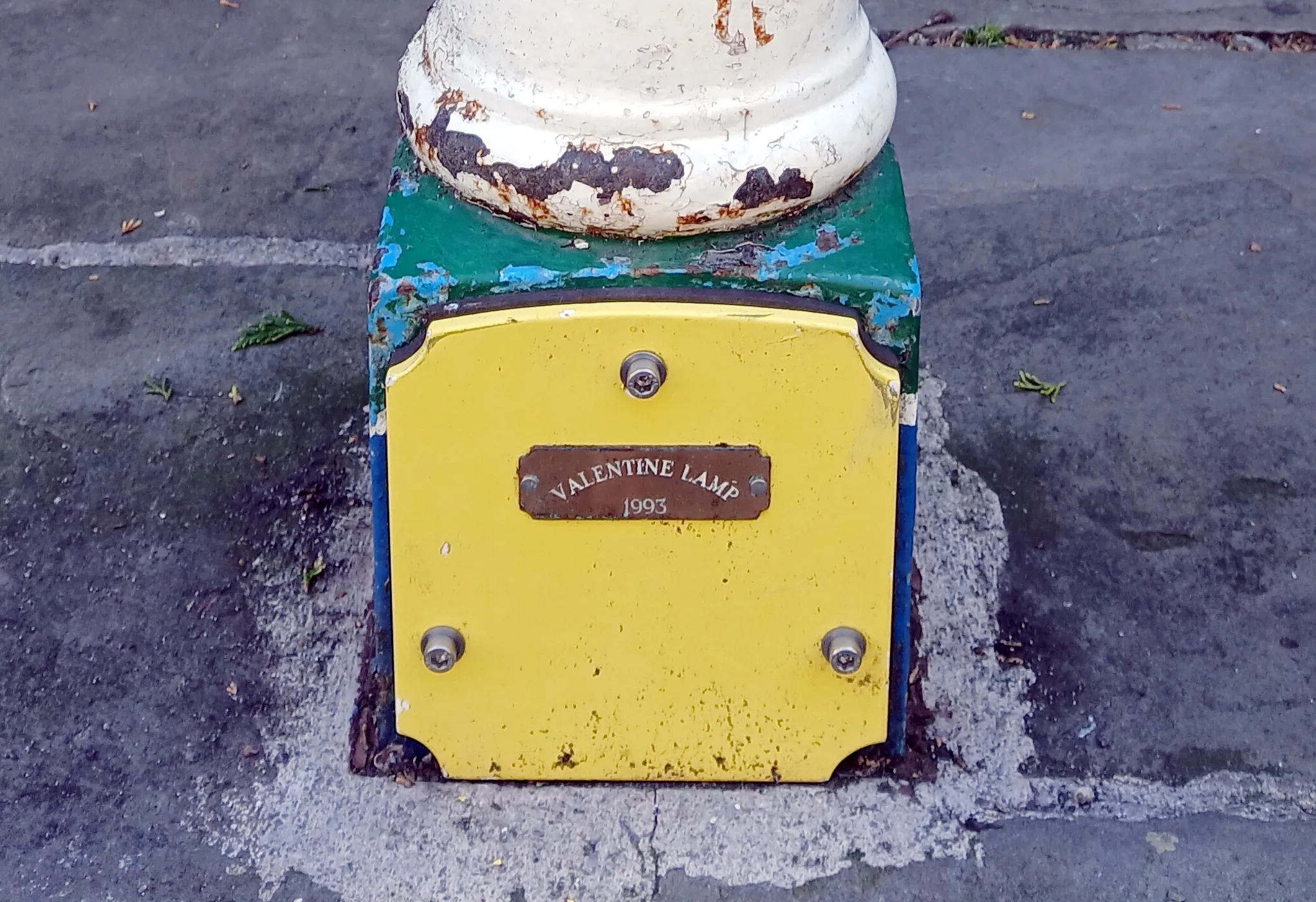 The base and yellow cover plate