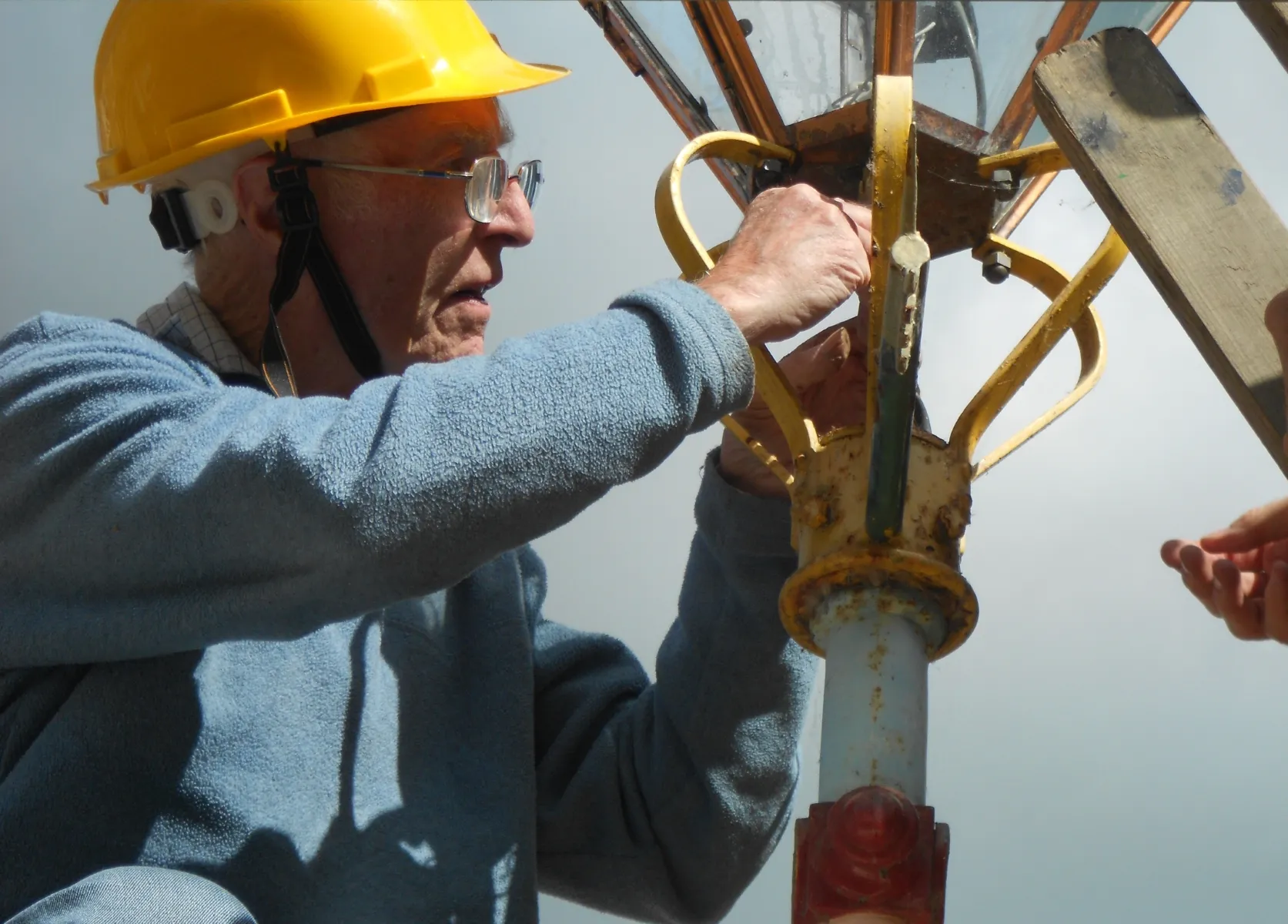 Reg fixing the Westminster lantern, 1993